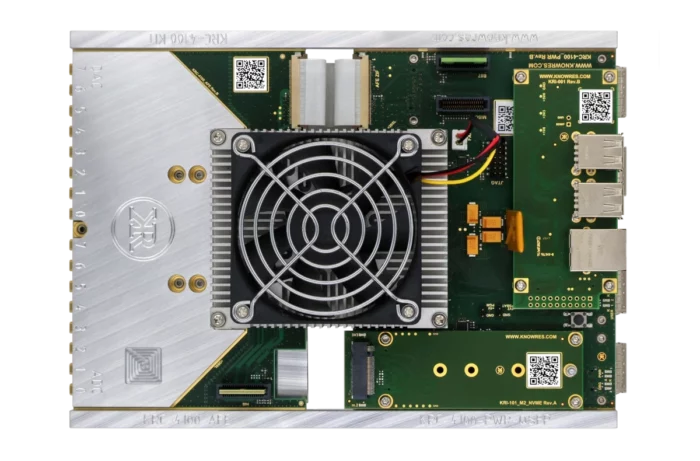 Top view of KRC-4100 evaluation carrier with KRM-4 module, heat sink, and fan.